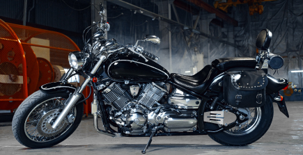 Motorcycle parked on a scenic Florida road, representing motorcycle insurance.